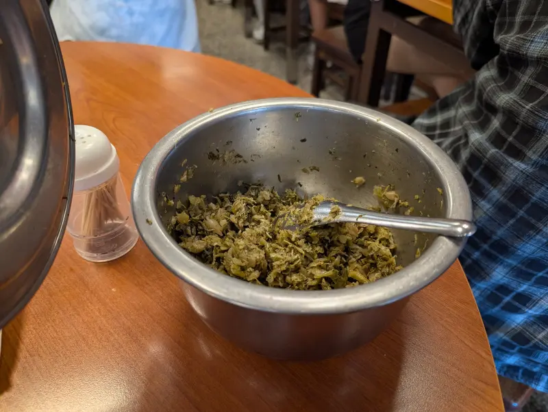 Pickled mustard greens at Entrance of Yongkang Beef Noodles