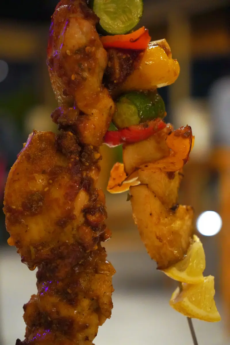 Close-up of chicken and vegetable skewers at Waterfront